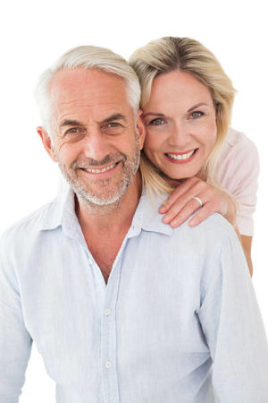 Close up portrait of happy mature couple over white background